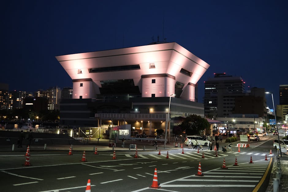 A stunning night view of the illuminated Osanbashi Pier Terminal in Yokohama, Japan.